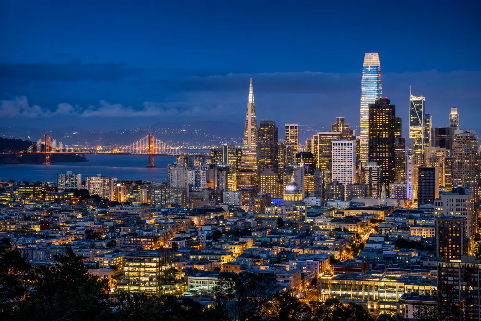 San Francisco skyline with Golden Gate Bridge at night