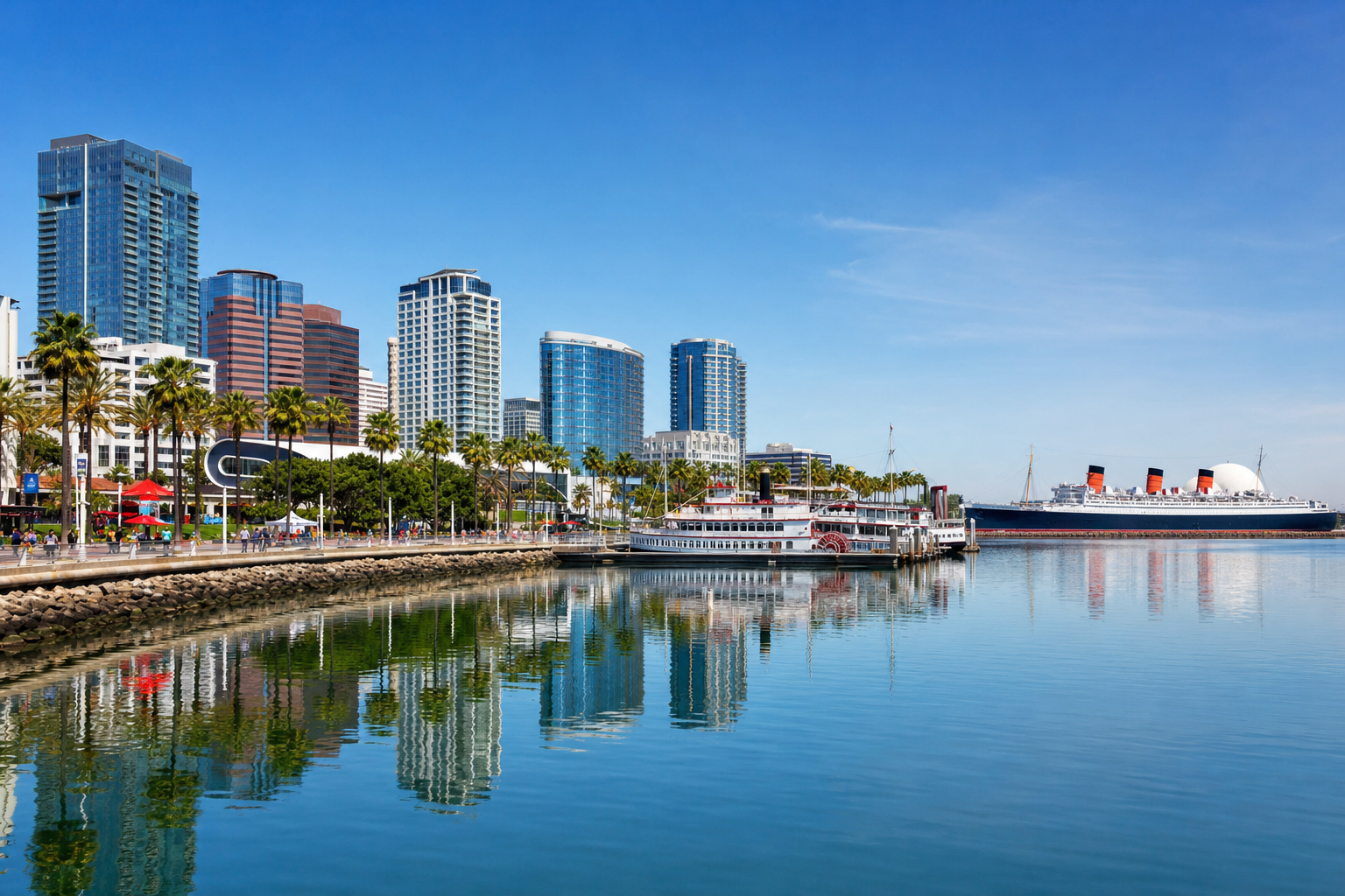 Long Beach California downtown skyline from Rainbow Harbor with Queen Mary